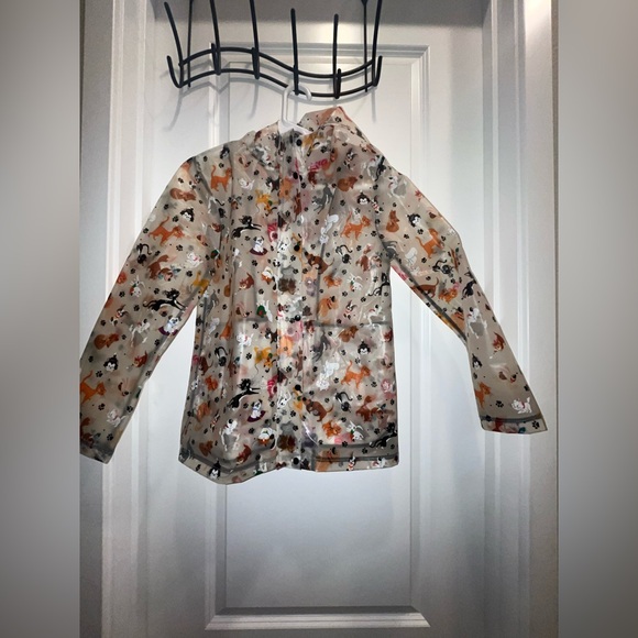 Disney Jackets & Blazers - Disney Parks Reigning Cats and Dogs rain jacket.
